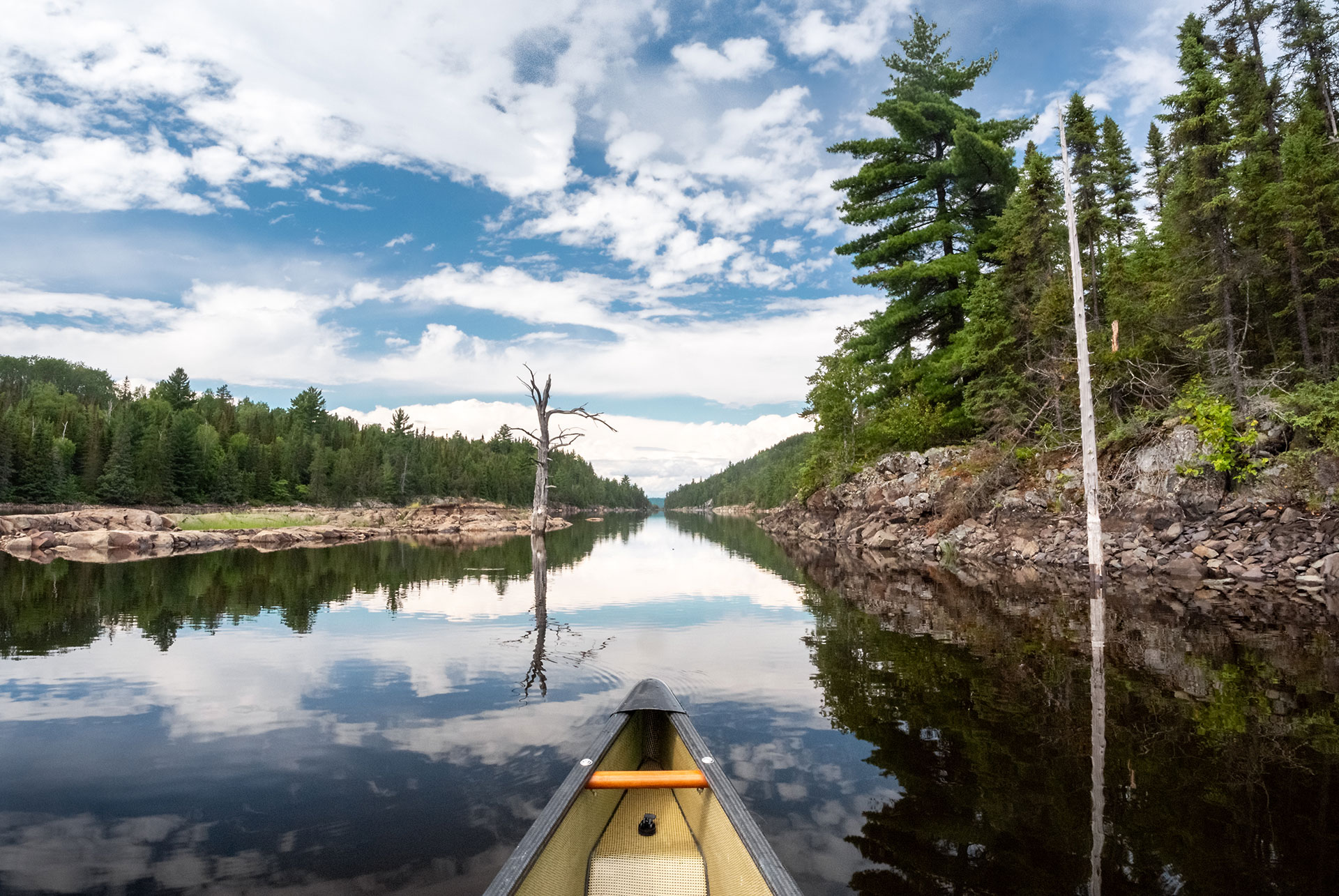 bow shot of a canoe floating on the Obabika River