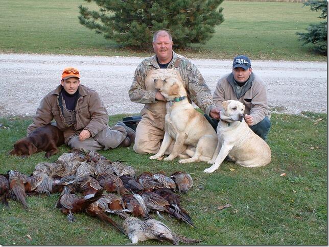 Hunters Paul Tremblay, Terry Vanderveeken and Shawn Mifflin with a mornings take of pheasant from the southern Ontario’s Pelee Island.