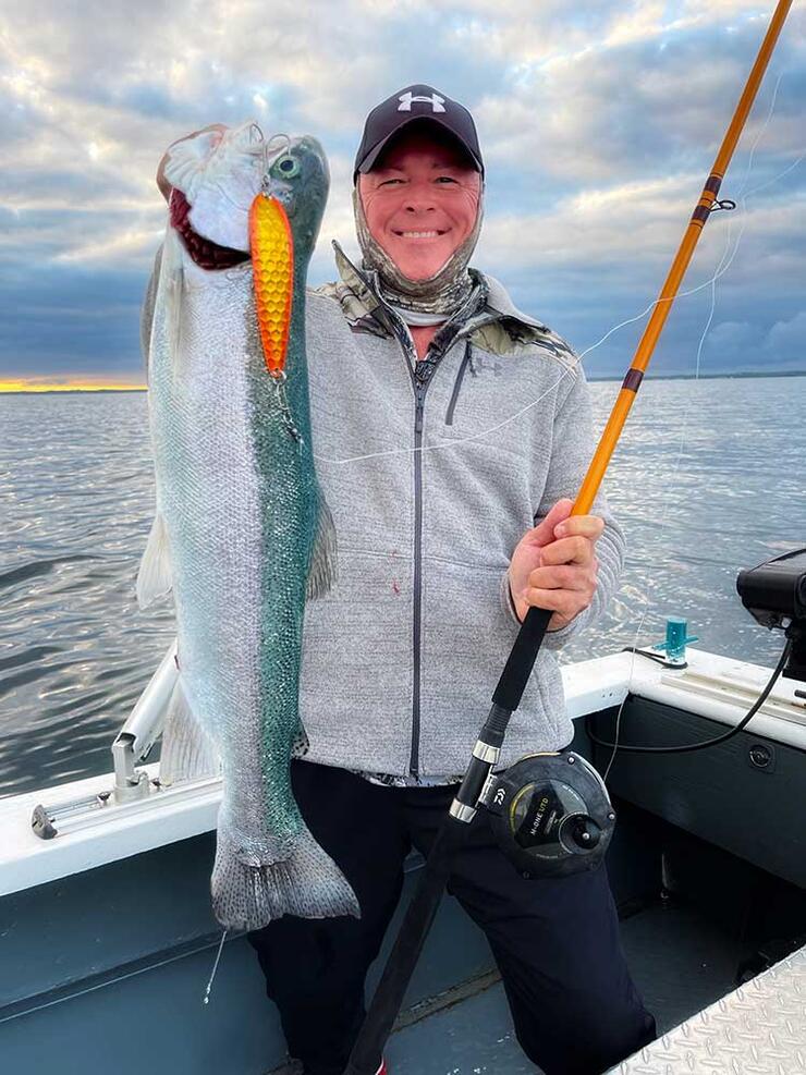 angler fishing trout