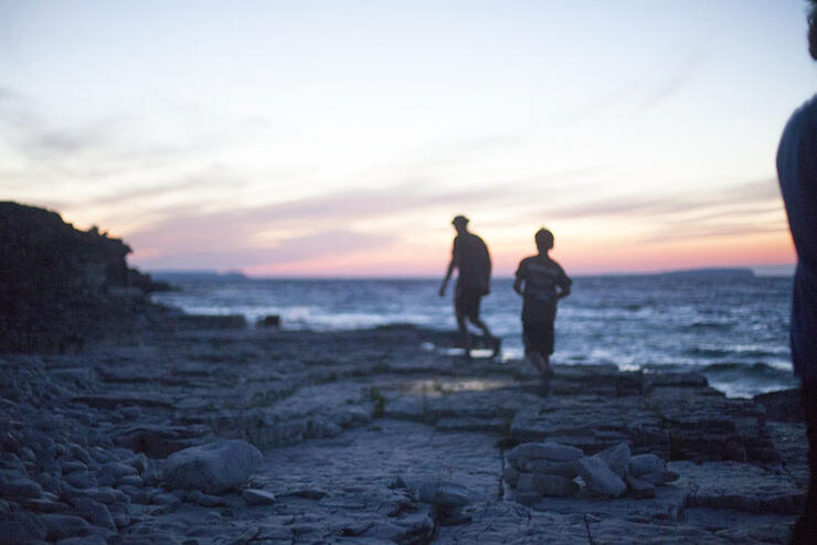 Family hiking near Sudbury at dusk