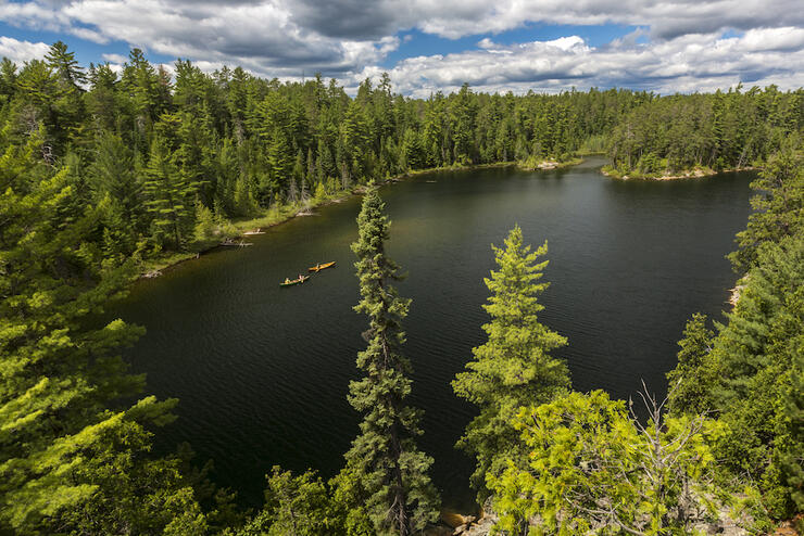 Two canoes on a wilderness lake