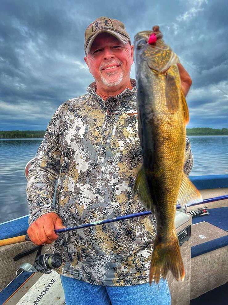 angler walleye fishing